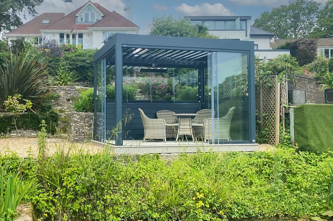 Brustor B200 pergola next to pond