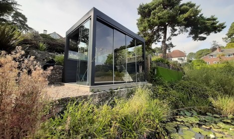 Glass Pergola next to Pond